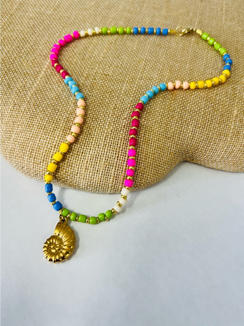 Hand Crafted Multicolor Beaded Necklace with Gold Shell Pendant